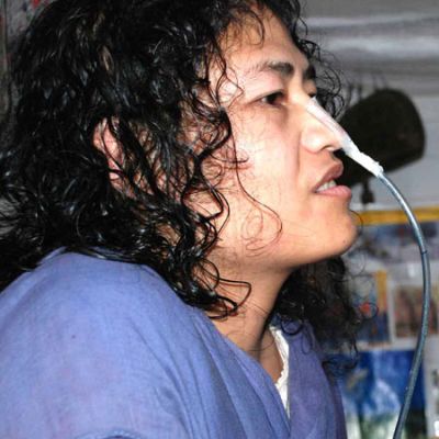 A picture of activist Irom Sharmila, with an oxygen pipe stuck to her nose.