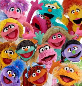 A picture of multicoloured puppets from the show 'sesame street'