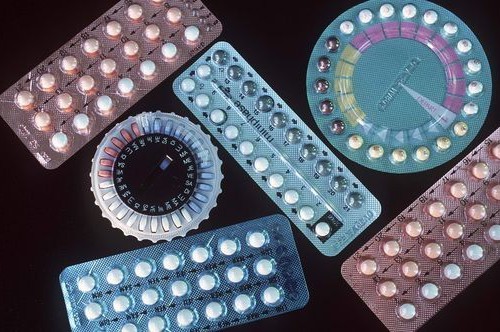 A picture of birth control pills in various colours