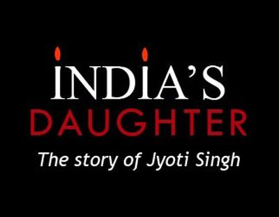 Poster of a documentary. On a black background is written, "India's Daughter - The Story of Jyoti Singh", with "Daughter" in red and everything else in white. The tittle of two i's in IndIa are flames, making the I's look like candles.
