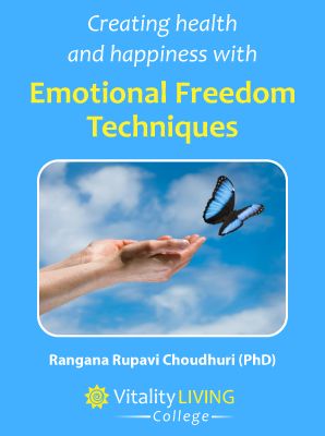 Against a blue background, the picture of a hand and a butterfly flying above it. The text on top reads 'Emotional Freedom Techniques'
