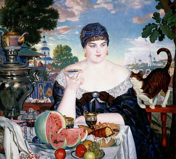 Painting of a white woman sitting at a table eating. On the table is watermelon, and a plate with other fruits. A cat stands near her.
