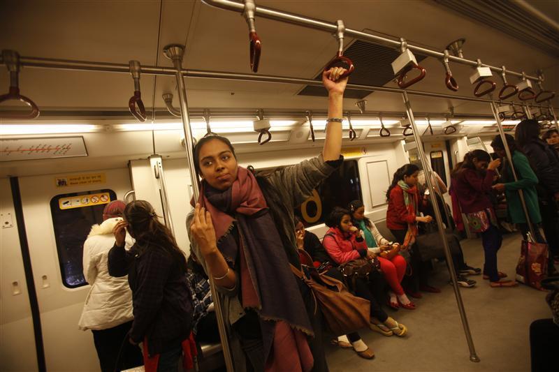 Simrat, 24, who works for a non-profit arts organisation, travels in the women's compartment of a metro in New Delhi