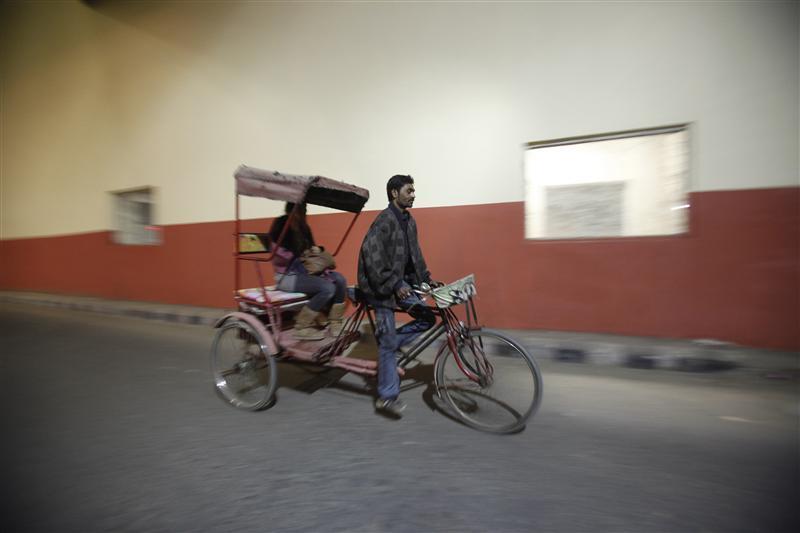 Simrat, 24, who works for a non-profit arts organisation, travels in a rickshaw in Gurgaon on the outskirts of New Delhi