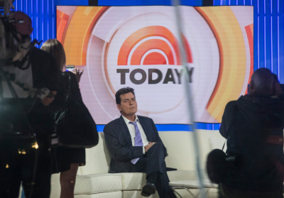 Charlie Sheen on The Today Show. Cameraperson is filming him.