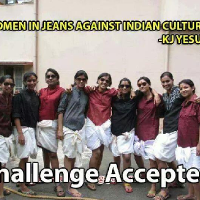 A group of girls wearing knee-length white dhotis, shirts, and goggles, with their hair tied back. "Women in jeans against indian culture - KJ Yesudas" is written opposite the photo. On the bottom is written "challenge accepted".
