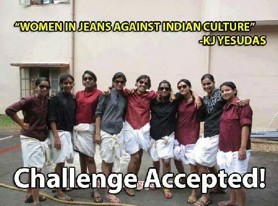 A group of girls wearing knee-length white dhotis, shirts, and goggles, with their hair tied back. "Women in jeans against indian culture - KJ Yesudas" is written opposite the photo. On the bottom is written "challenge accepted".