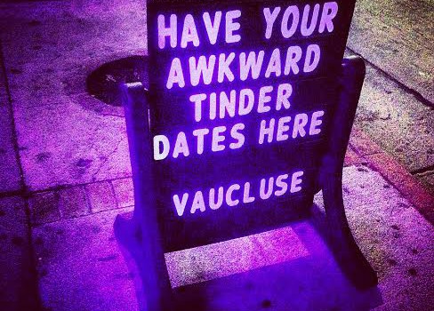 A roadside board reads, "Have your awkward Tinder dates here.