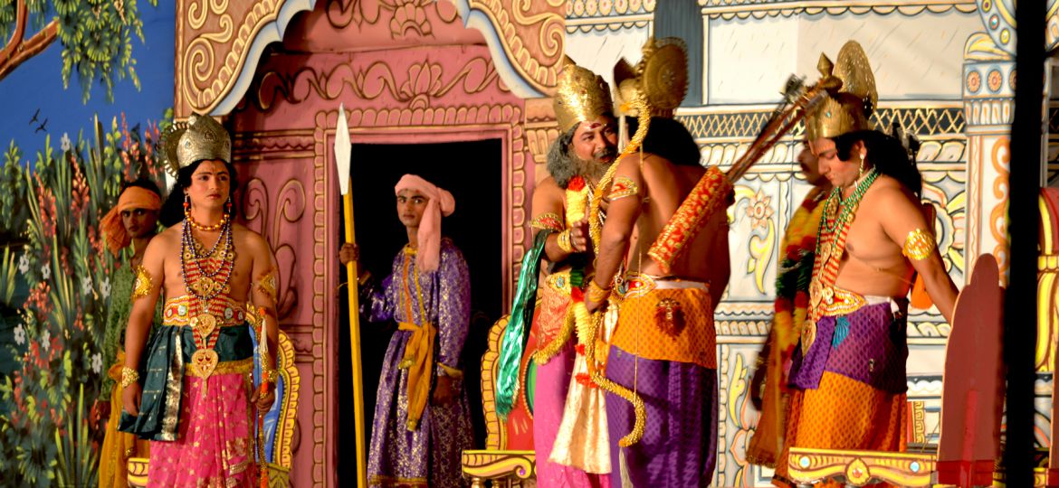 The staging of a Ramleela performance, with actors dressed in costumes representing mythological figures