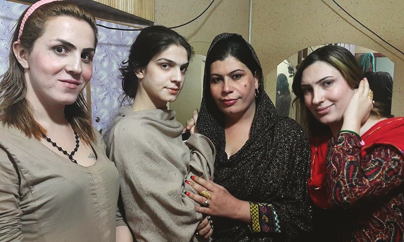 Photo of four transgender people.