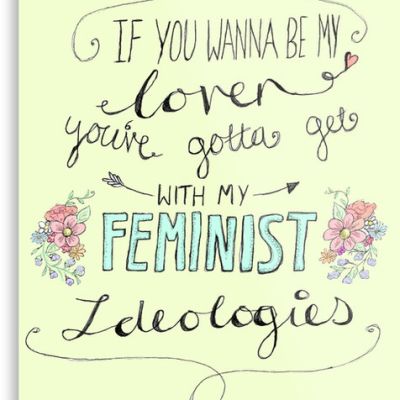 Written in black and cursive on a yellow background, "If you wanna be my lover, you've gotta get with my feminist ideologies." "Feminist" is written in caps, bold, and blue.