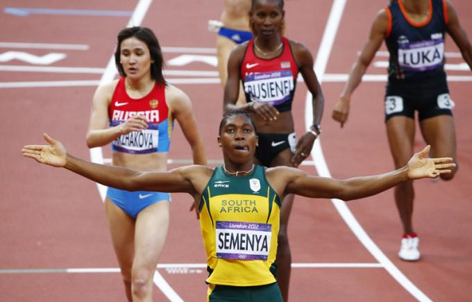 South Africa’s Caster Semenya raises her arms after her first place finish in her women’s 800m semi-final during the London 2012 Olympic Games on 9th August 2012.
