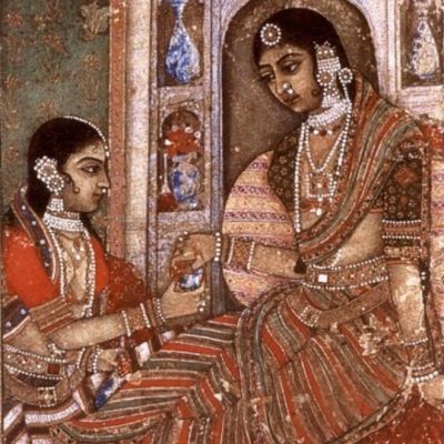 Artwork showing two women sitting, both wearing saree and heavy jewellery. Screen reader support enabled. Artwork showing two women sitting, both wearing saree and heavy jewellery.
