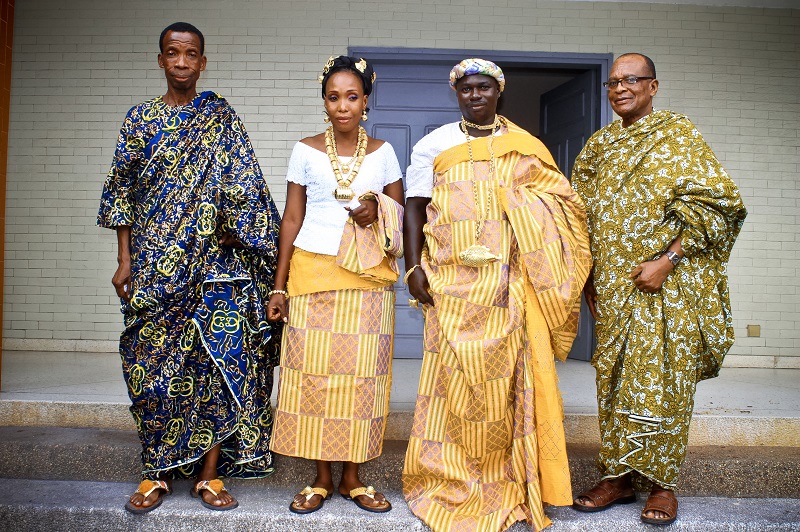Portrait of a group of people dressed in traditional attire from a part of Africa.