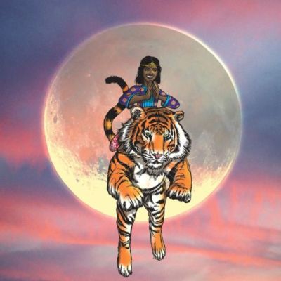 A dark-skinned girl riding a tiger. They are in air as the tiger takes a leap - with the Sun right behind them. The sky is orange-blue as in sunset or sunrise.
