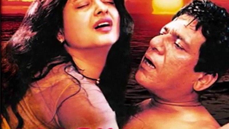 A photo of actors, Rekha and Om Puri from the movie, Aastha: In the Prison of Spring