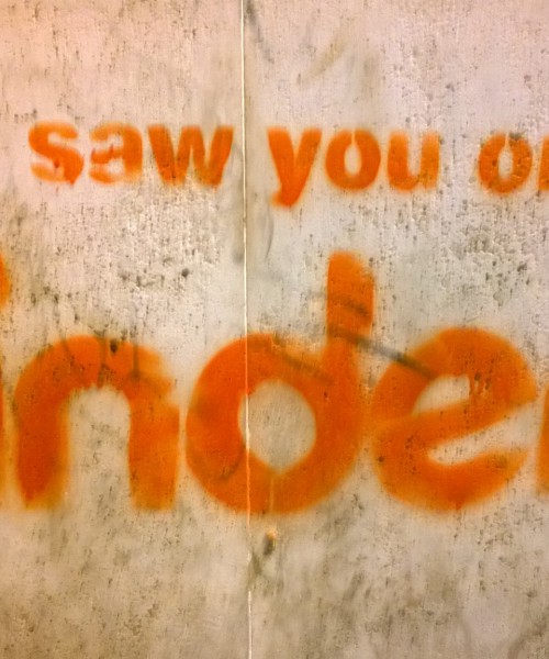 Its a photo where there is a text that says, 'I saw you on tinder' in red.