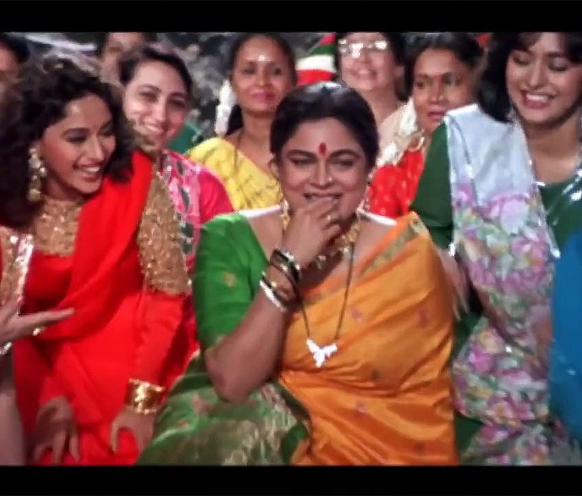 Its a still from the movie, Hum Aapke Hain Koun, featuring Madhuri Dixit, Reema Lagoo & Sahila Chadda