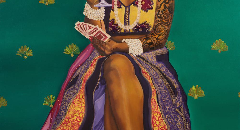 Nimisha Bhanot's painting titled "Money, Kitty Parties & Clothes Is All A Bahu Knows". A brown woman sits on a stool with her legs crossed, red wine in right hand, and cards in the left. She wears a cut-sleeves lehnga; heavy white jewellery in the neck and wrists; and mehndi in hands, full arms, and feet. The lehnga is pulled-up till the knee, showing her legs. She weas a bindi, a nose ring, and a red lisptick, and is staring straight-ahead expression-less.