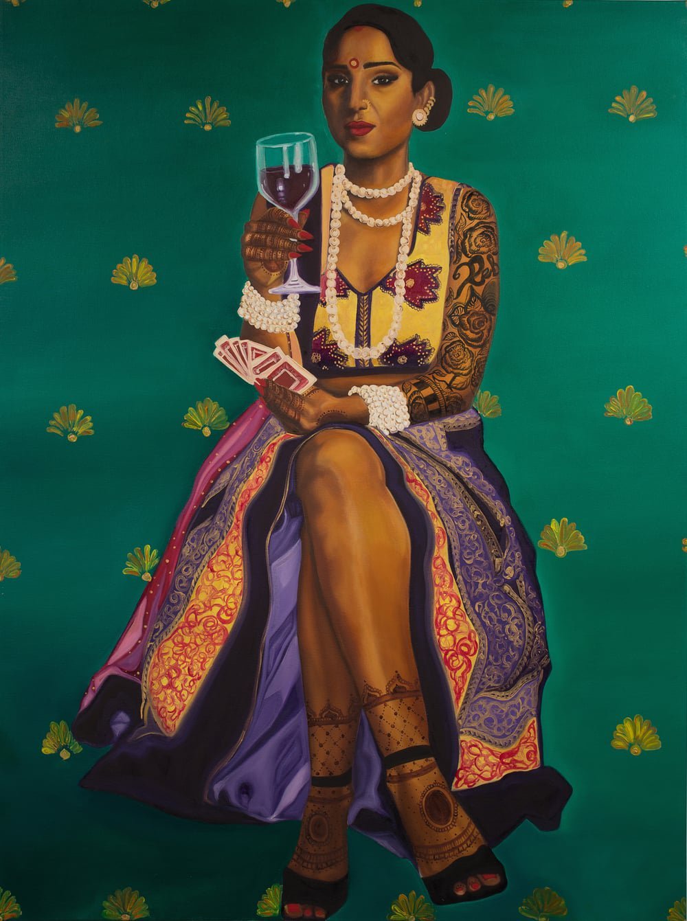 Nimisha Bhanot's painting titled "Money, Kitty Parties & Clothes Is All A Bahu Knows". A brown woman sits on a stool with her legs crossed, red wine in right hand, and cards in the left. She wears a cut-sleeves lehnga; heavy white jewellery in the neck and wrists; and mehndi in hands, full arms, and feet. The lehnga is pulled-up till the knee, showing her legs. She weas a bindi, a nose ring, and a red lisptick, and is staring straight-ahead expression-less.