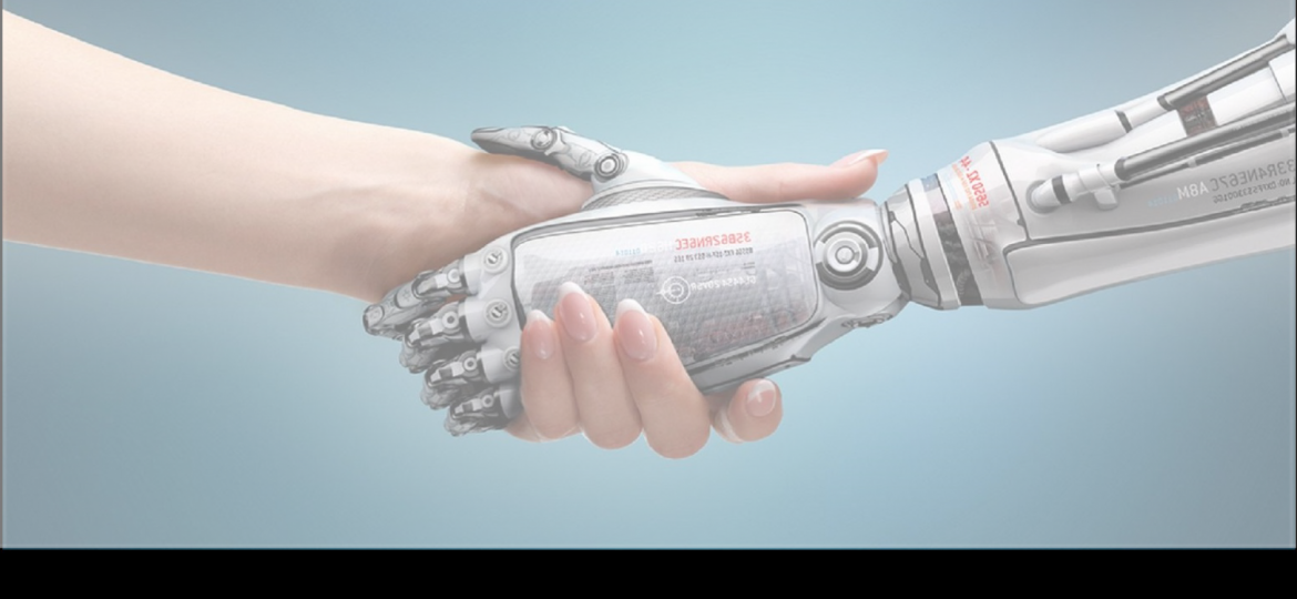 A human and a robot shaking hands. Only see the hands and arms of both is seen.