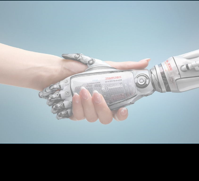 A human and a robot shaking hands. Only see the hands and arms of both is seen.