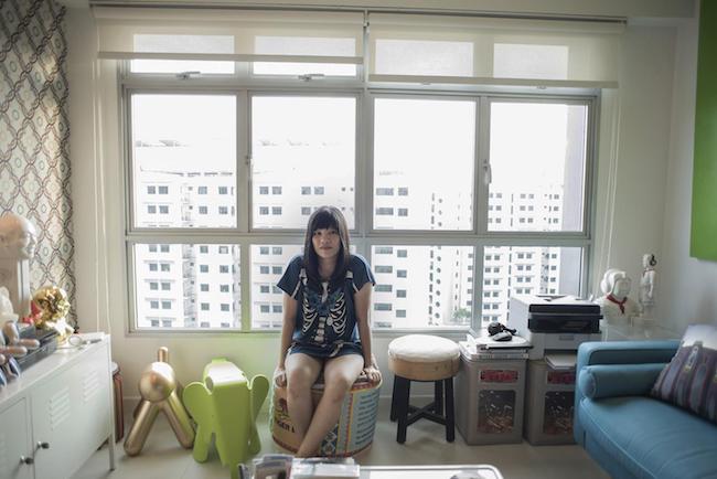 June's apartment, filled with Asian pop art. Like 80 percent of Singaporeans, she lives in a government-supplied HDB flat (Housing Development Board).