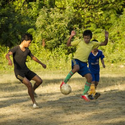 boys playing football in Manipur