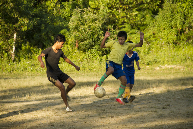boys playing football in Manipur