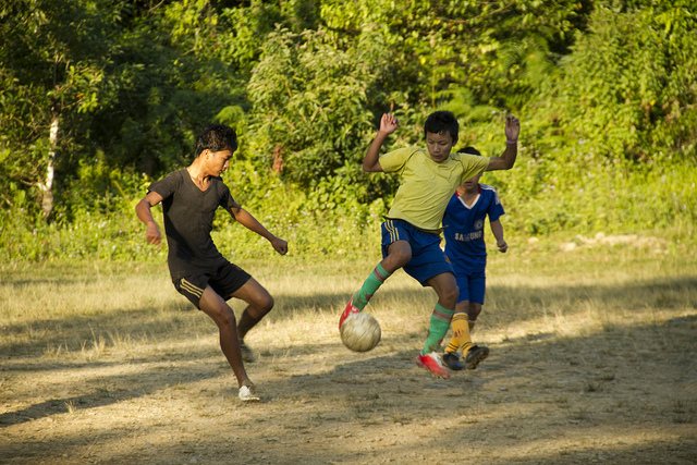 boys playing football in Manipur