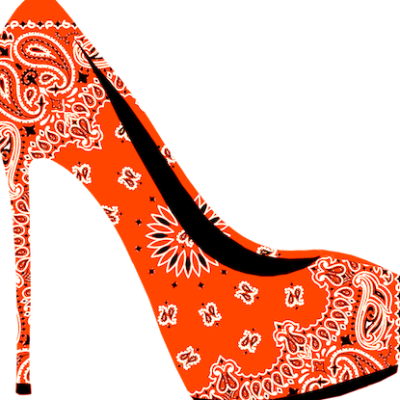 picture of a high-heel shoe, it is orange in colour with patterns on it