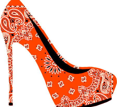 picture of a high-heel shoe, it is orange in colour with patterns on it