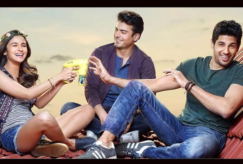 a still from 'Kapoor and Sons', two men and a woman sit together, laughing