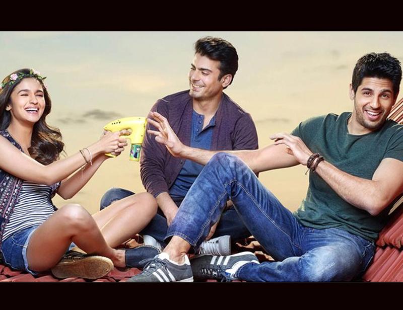 a still from 'Kapoor and Sons', two men and a woman sit together, laughing