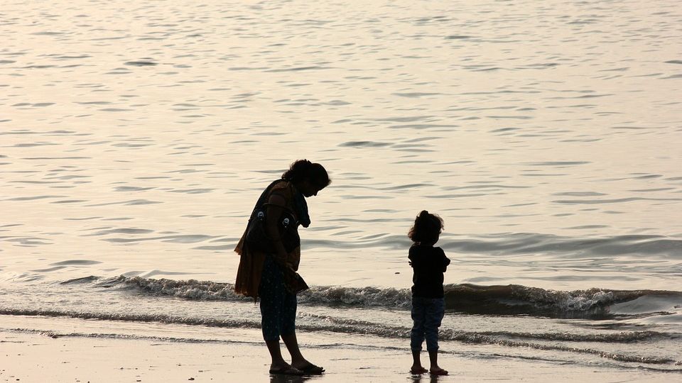 silhouette of a mother with her child