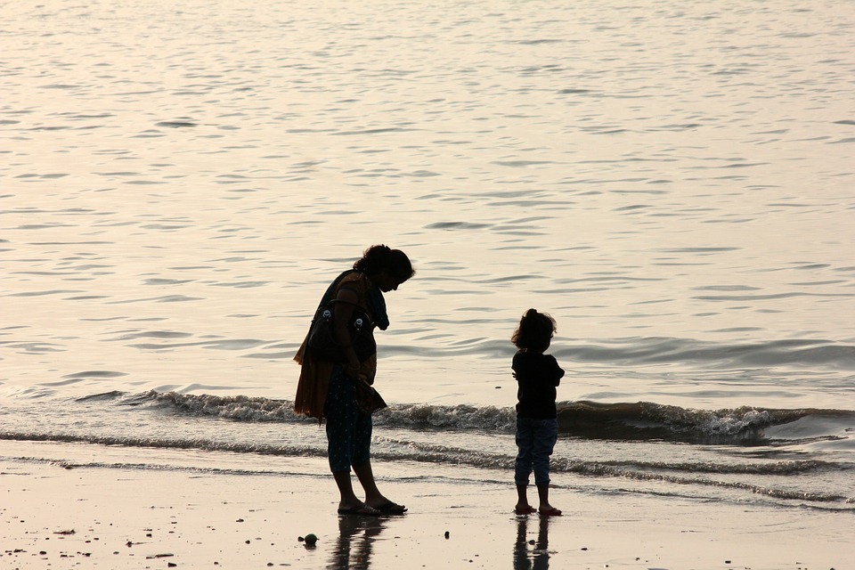 silhouette of a mother with her child