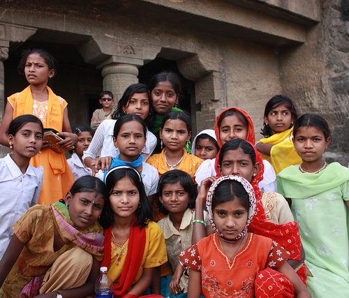 picture of a group of young girls posing together, in rural India