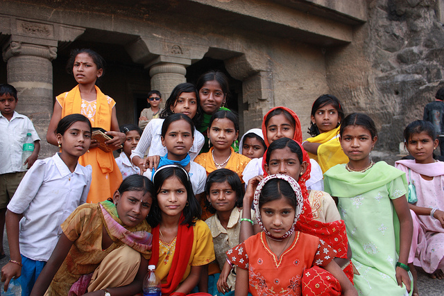 picture of a group of young girls posing together, in rural India