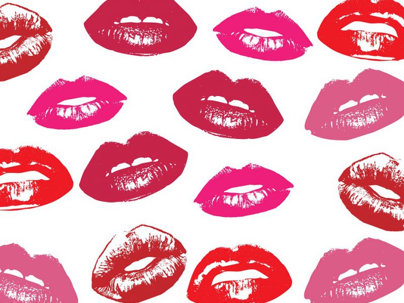 Illustrations of multiple lips wearing various shades of red lipstick