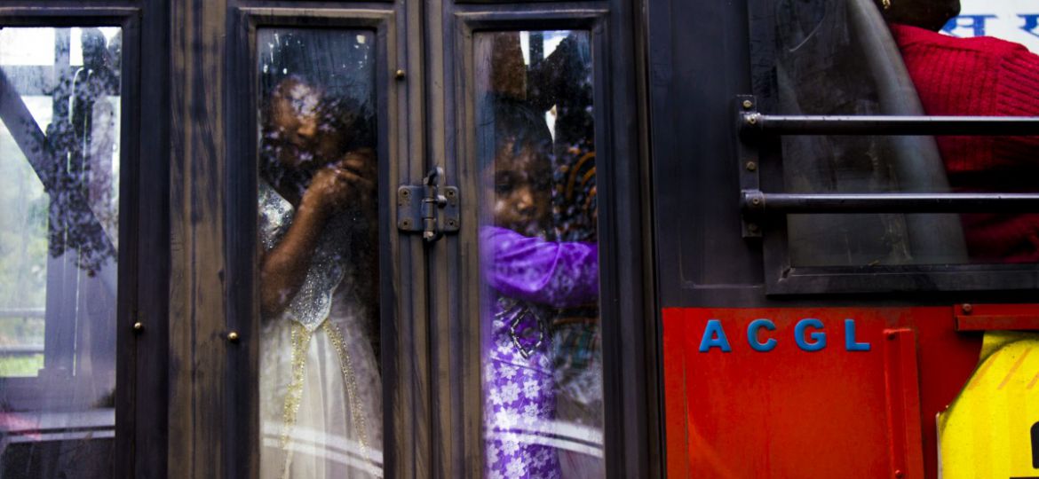 women travelling in a public bus