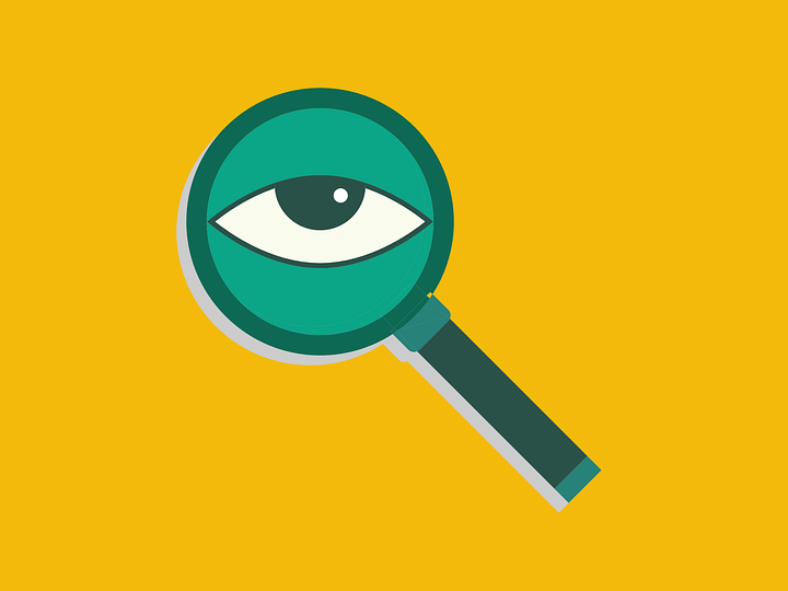 female private investigators in india: picture of an eye looking through a magnifying glass