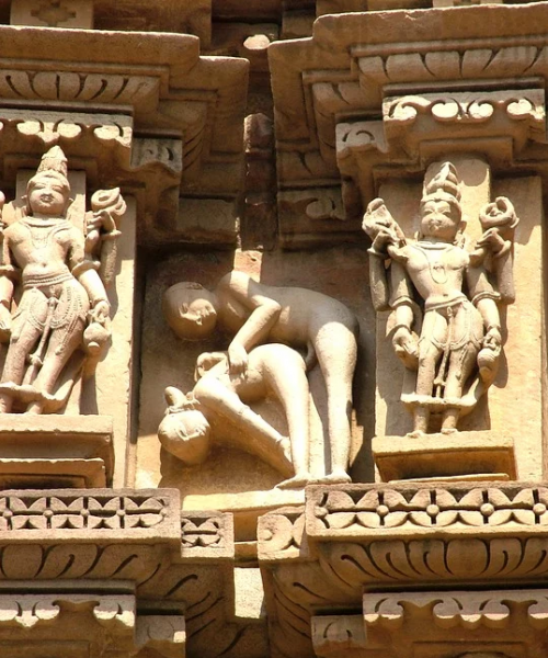 A carving from khajuraho, depicting a sexual position