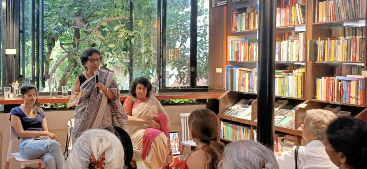 A photograph of Kalpana Sharma, Sharda Ugra, and attendees at an event around the book ‘Single by Choice: Happily Unmarried Women’.