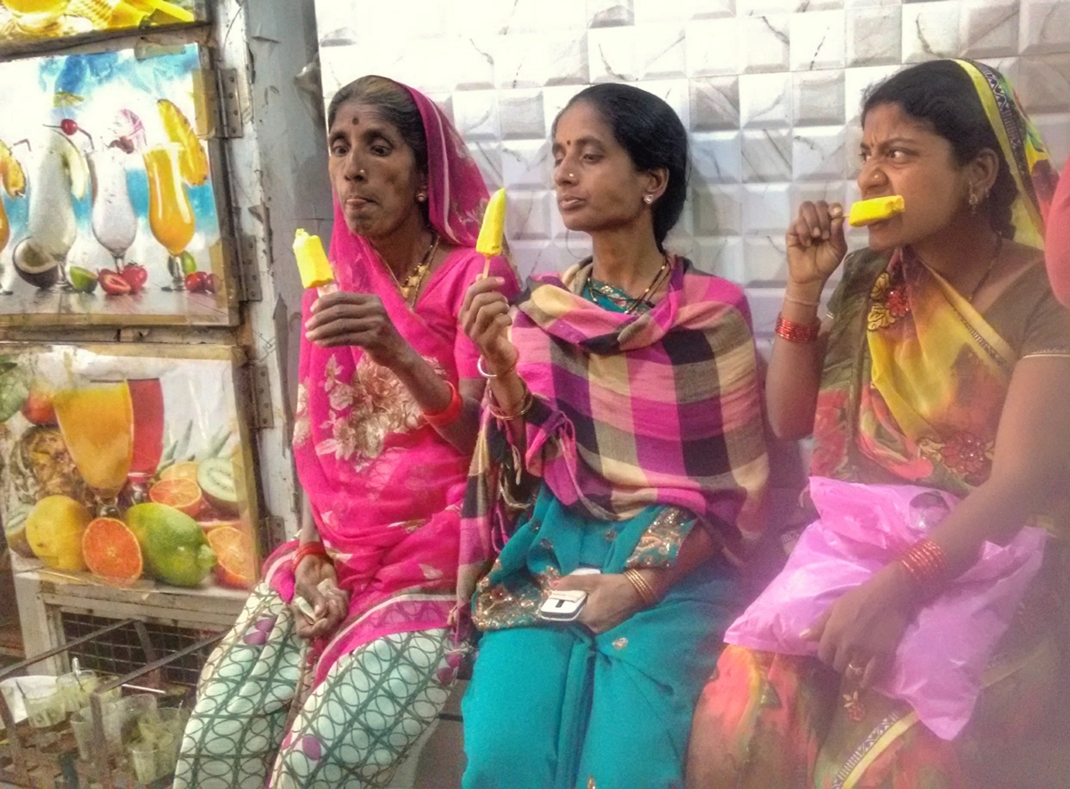 Women at Leisure: Women enjoying an ice cream break on a hot summer afternoon.