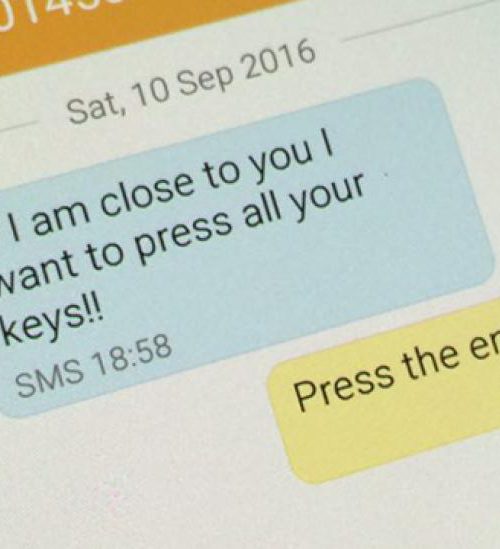 A close-up image of a text message. At the top is the number of the sender, which is half hidden. Below that is the date the text messages were sent and it reads “Sat, 10 Sep 2016.” The sender’s message is below the date in a blue text bubble and the text says, “If I am close to you I want to press all your keys!! SMS 18:58.” The receiver’s message appears below in a yellow text bubble and says, “Press the Enter Key! SMS 19:00.”