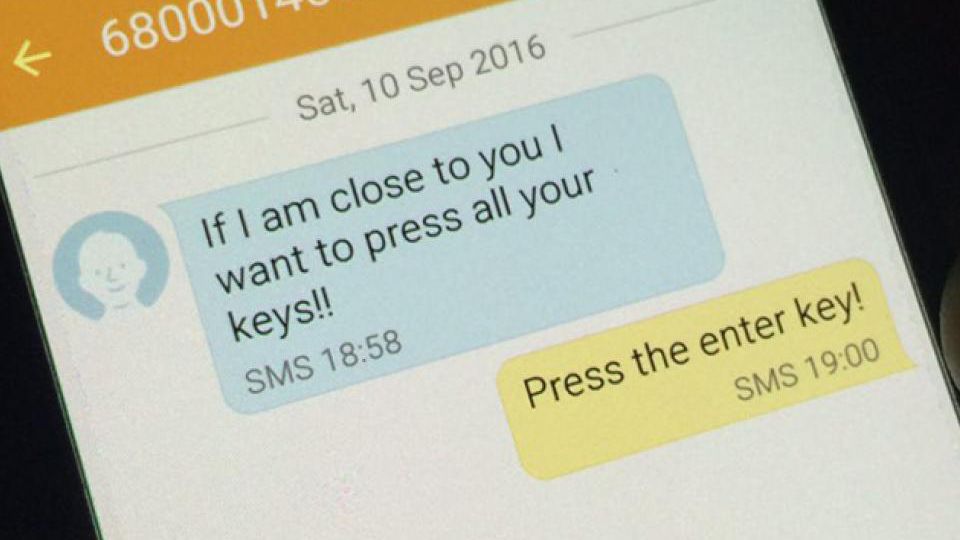 A close-up image of a text message. At the top is the number of the sender, which is half hidden. Below that is the date the text messages were sent and it reads “Sat, 10 Sep 2016.” The sender’s message is below the date in a blue text bubble and the text says, “If I am close to you I want to press all your keys!! SMS 18:58.” The receiver’s message appears below in a yellow text bubble and says, “Press the Enter Key! SMS 19:00.”