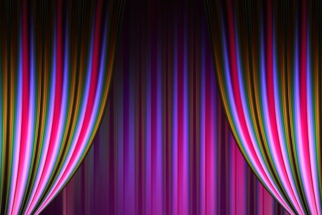An illustration of stage-curtains in bright color.