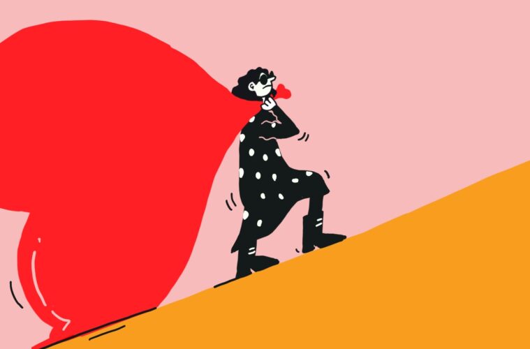 An illustration of a person with thick wavy black hair, wearing black sunglasses, knee-length polka dots dress and black boots who is dragging a big red heart-shaped bag/balloon behind them in an upward slope. The background is a solid salmon pink and the slope is a solid mustard colour.