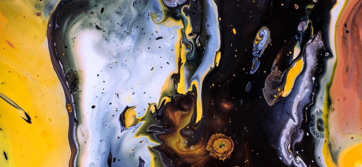 An abstract illustration of swirling patterns and splotches of mustard yellow, black, pale blue, deep orange and pale crimson. The patterns look like galaxies.