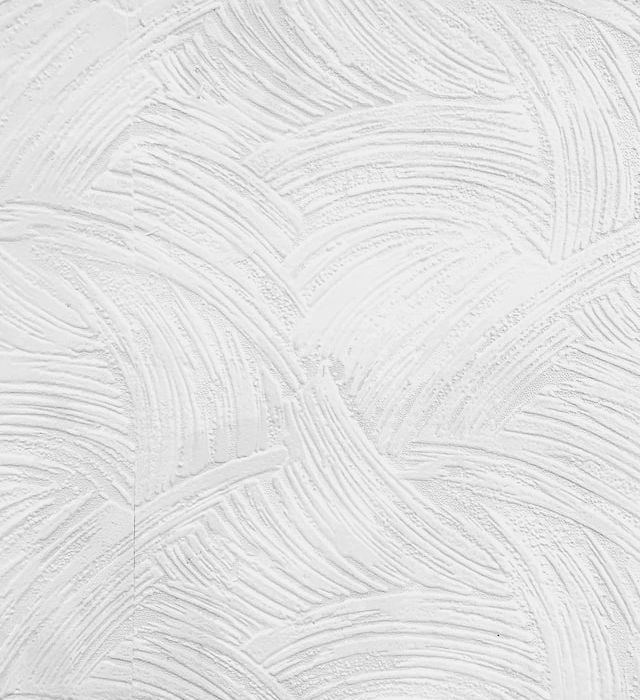 grey concrete surface with patterns of swirls